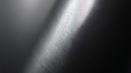 Abstract black metal texture with subtle reflections, close-up view, even studio lighting