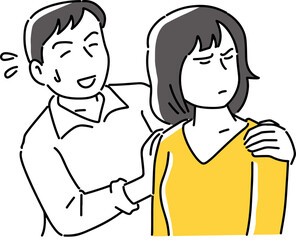 ふてくされる女性をなだめる男性