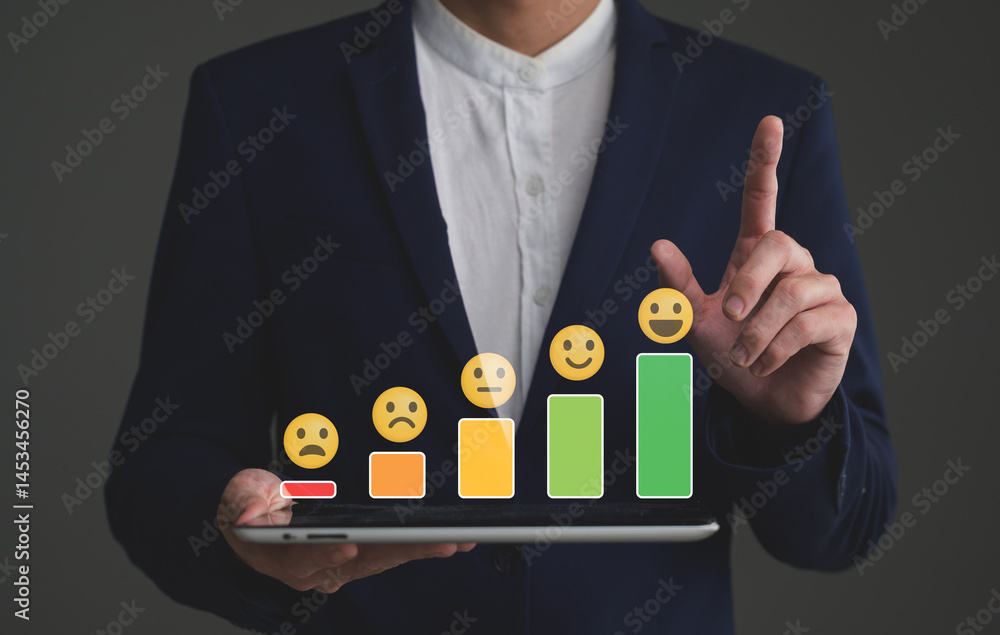 Poster a businessman in a suit holds a tablet displaying a satisfaction rating bar graph with emoji faces, 