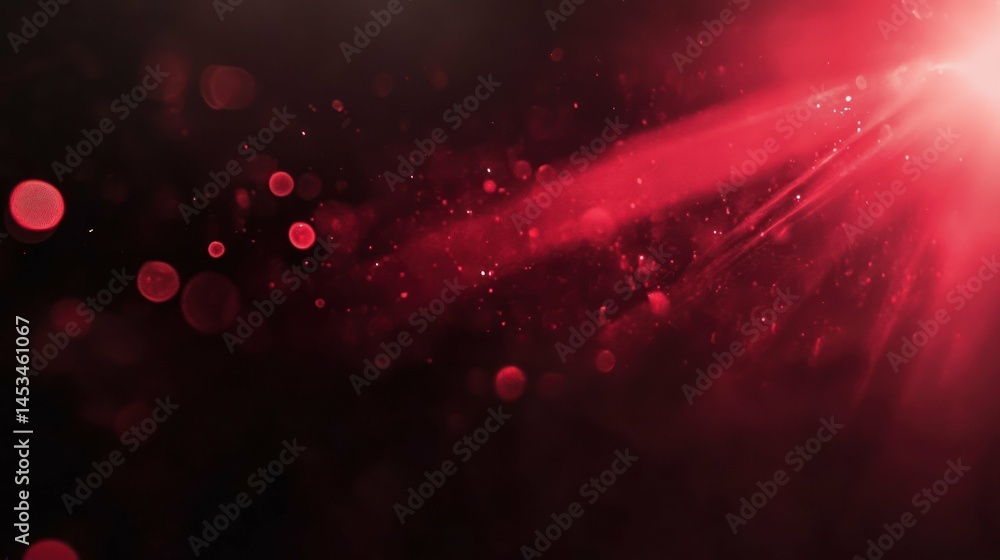 Poster abstract red light bokeh background with bright glitter and rays.