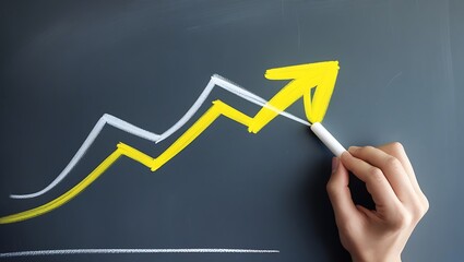Hand Drawing Yellow Upward Trending Arrow Graph on Chalkboard