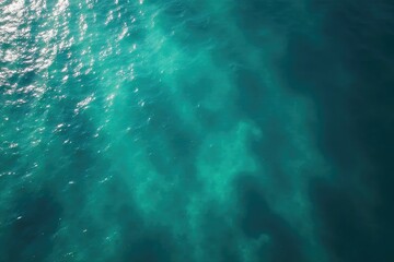 Obraz premium Abstract swirls of lake water, aerial view, teal hues, drone, vivid