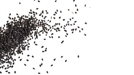 Fototapeta premium Black Sesame Seeds Flying Isolated on White Background. Dynamic and Nutritious Ingredient.