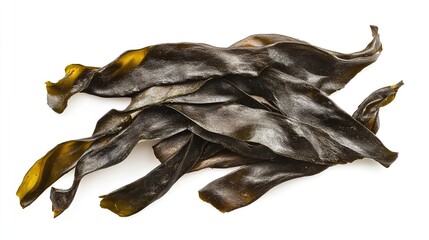 Fototapeta premium Dried Kombu Seaweed, Japanese Dry Kelp Isolated on White Background, Top View. Traditional Japanese Cuisine Ingredient and Health Food.
