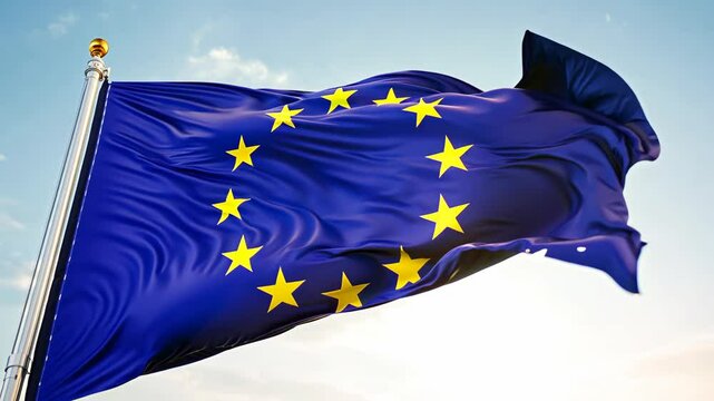 European union flag waving against clear blue sky in gentle breeze