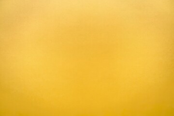 Fototapeta premium A photo of a perfectly flat yellow uniform background