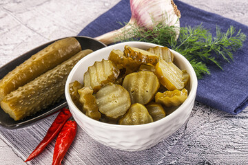 Sliced marinated cucumbers in the bowl
