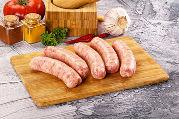 Raw meat sausages for grill
