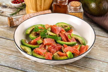 Salad with avocado and salmon