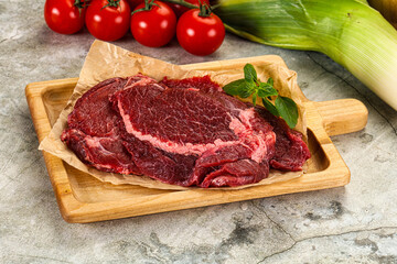 Raw beef cheeks cut for cooking
