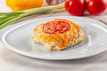 Chicken chop cutlet with cheese and tomato