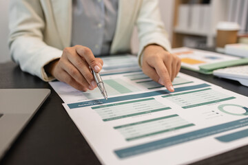 working in the office with a lot of paper work, businessman is checking marketing data, e an employee is working with finance document, sitting in the office working for accountant company