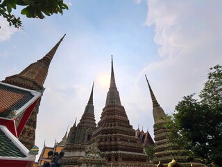 Fototapeta premium Temple Spires Reaching Towards the Sky in Bangkok