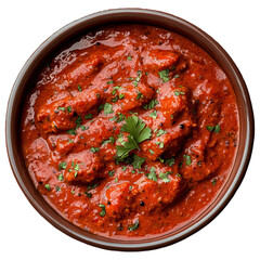 Chicken Tikka Masala, an Indian dish made with marinated and sautéed spiced fried or deep-fried chicken in a red hot sauce with spices like coriander leaves and cumin seeds