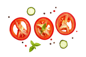 Fototapeta premium Fresh Tomato and Cucumber Slices with Basil Leaves and Peppercorns for Healthy Salad or Gourmet Cuisine Preparation
