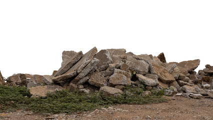 Concrete debris from road demolition isolates piled up on the ground.