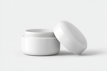 Open white cosmetic cream jar with cap isolated on white background