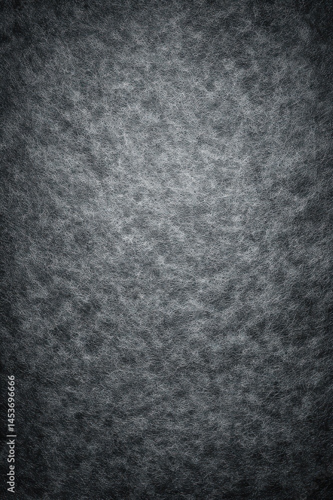 Poster a stunning image of textured dark gray background with space for text or design.