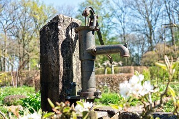 Old water pump in garden