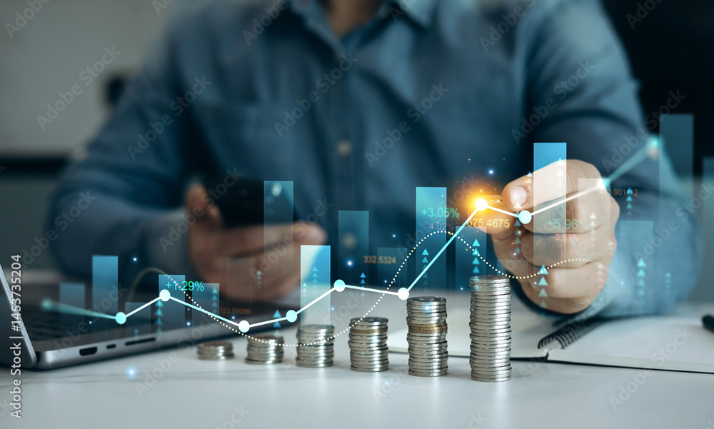 Leinwandbilder Close up hands draw arrow above coin stack.Stack of coins with trading price graph growth.Money business financial graph diagram of coin.Financial growth data investment market profit  and success.