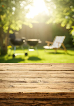Empty wooden table in blurred backyard setting perfect for summer barbecue grill party products display montage