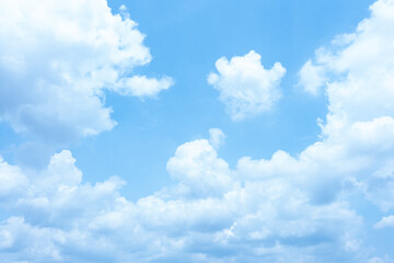 Fototapeta premium Serene Blue Sky with Fluffy White Clouds Peaceful Nature Background Image