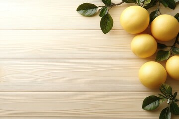 A wooden background serves as the setting for a display of fresh ripe tangerines, complete with their leaves and a vacant area for copying