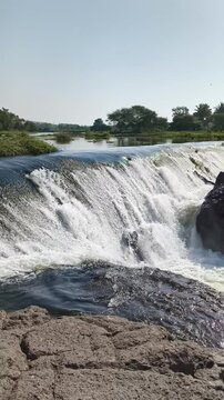 verticle view of the water fall on the river