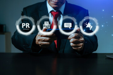 PR, Public relations concept. hands using laptop and tablet with public relations icon for communication advertising marketing strategy.