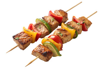 Grilled tofu skewers with colorful bell peppers and zucchini against black background