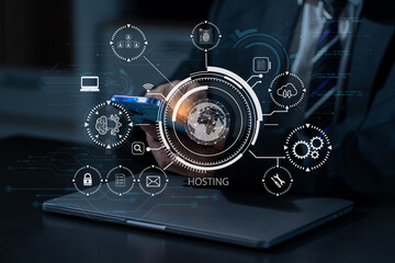 Person using computer, tablet and presses his finger on the virtual screen inscription Hosting on desk, Web hosting concept, Internet, business, digital technology concept.