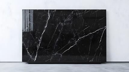 Modern black marble surface against a neutral backdrop.