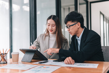 Collaborative business meeting on digital strategy modern office teamwork session bright environment engaged viewpoint