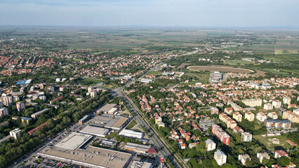 Aerial view of suburban houses in new modern development area. Small city on aerial view. Scenic seasonal landscape from above aerial view of a small town in countryside Pancevo, Serbia 