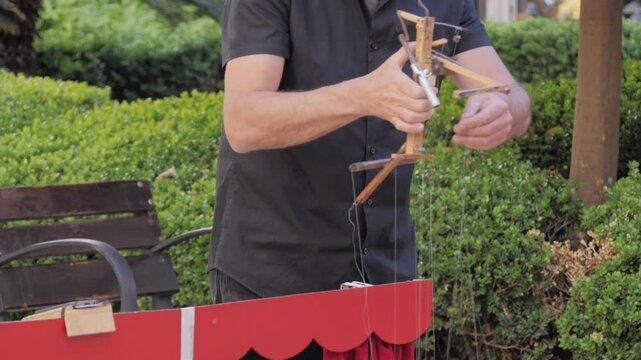 Old and original wood system or control mechanism for a puppet doll. Marionette controlled from above using wires or strings in the hands of the puppeteer