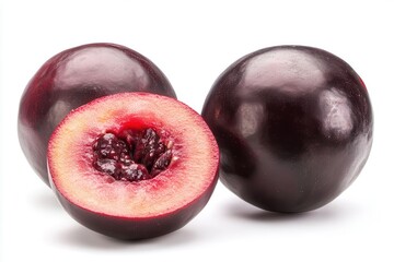 Freshly cut ripe plums showcasing vibrant colors and textures, perfect for healthy recipes