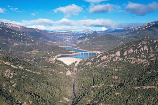 Aerial view of Embassament de la Baells and Reservoir de la Baells on sunny winter day. Berga, Barcelona, Spain.