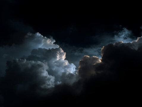 Mysterious black clouds in dark night sky scene