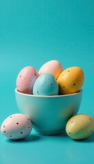 Speckled & solid Easter eggs in bowl & cup on blue , decor, celebration, egg
