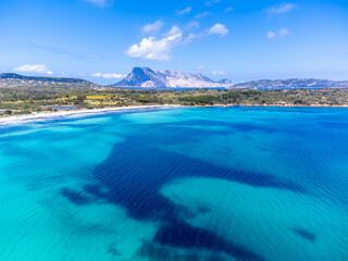 Drone view of beautiful Cala Brandinchi beach in springtime