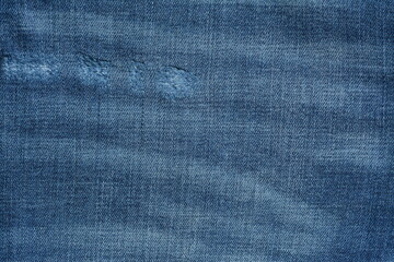 Fabric denim blue background with worn effect