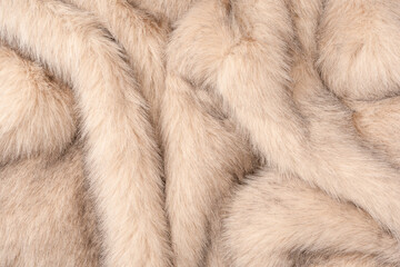 Texture of faux fur as a background, top view.
