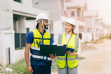Construction Engineer team, Engineers teamwork man and women working together at construction site