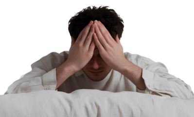A man covering his face with both hands, feeling bad and suffering from a headache, isolated on a transparent background cutout PNG file.