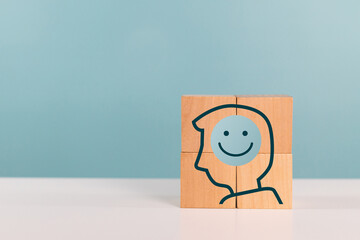 Wood block with smile face in brain represents good mood, positive thinking, relax mood hormones...