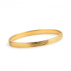 Fototapeta premium Minimalist gold bangle with polished finish and wave pattern close up white studio background.