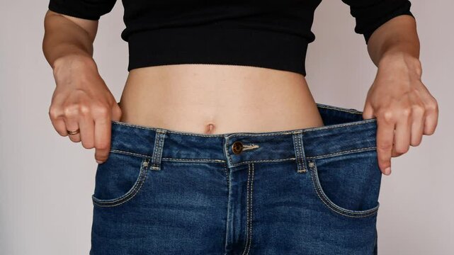  The result of a healthy lifestyle, belly and waist drowned in the same old jeans