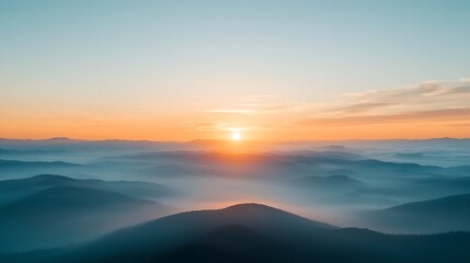 Majestic Aerial Sunset Over Misty Mountains