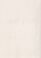 Closeup view of a textured offwhite paper surface