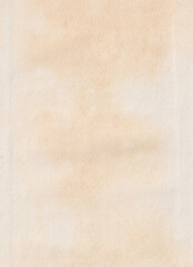Close-up of a textured, aged beige paper surface.